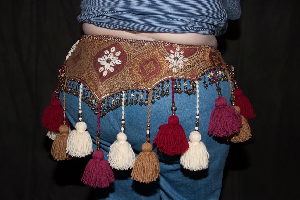 Wine tapestry fabric belt with wine and gold yarn tassels